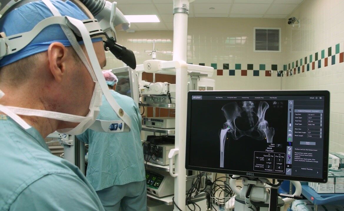 Dr. Jason Davis looks at an X-ray image